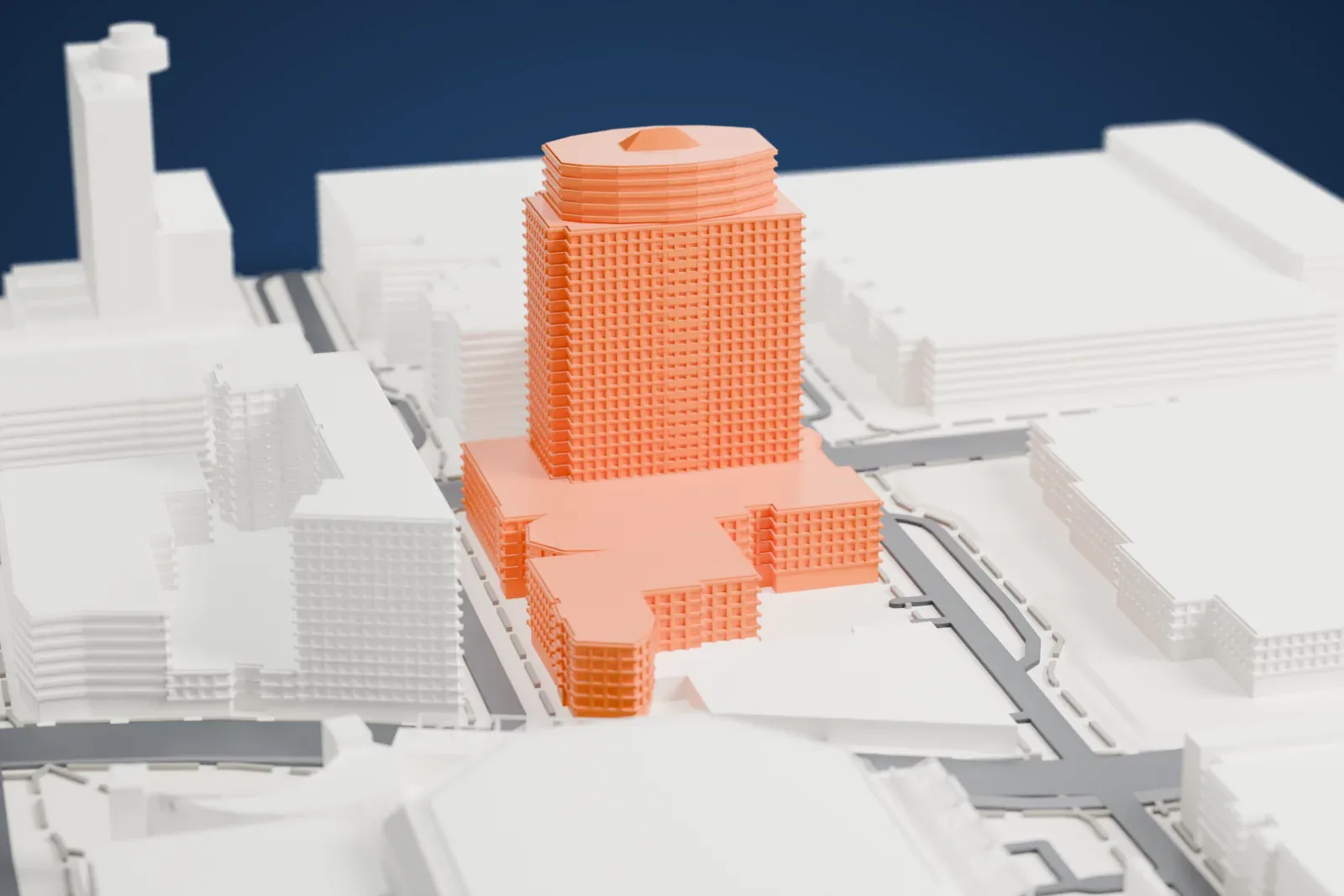 A white 3D print of the Bank of America Tower, a tall tower with a rounded latticed crown and a low podium, among downtown buildings, wide roads and an octagonal building.
