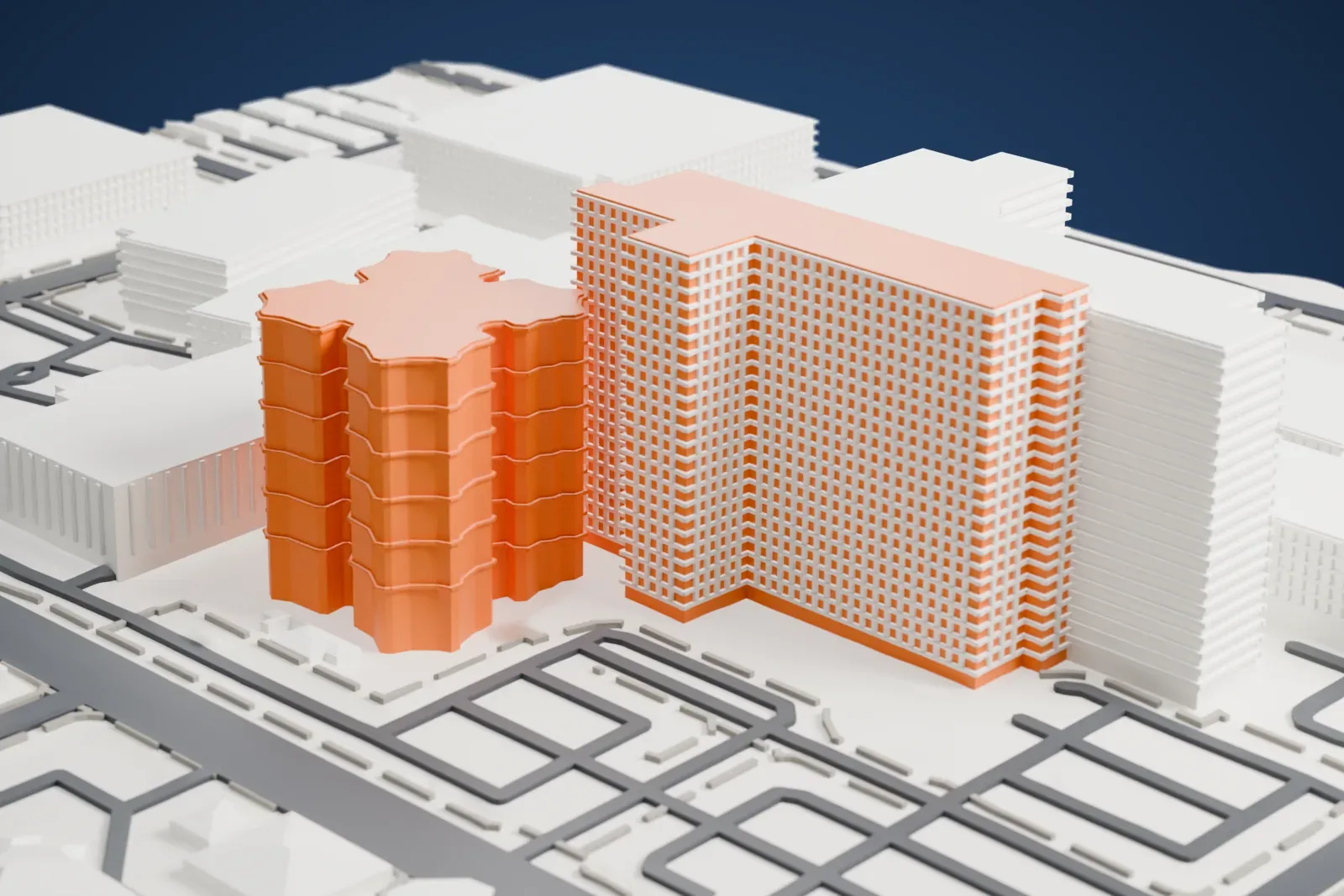 A white 3D print of Banner – University Medical Center Phoenix, a rounded tower with scalloped walls and small blocks on the roof, beside low buildings and roads.
