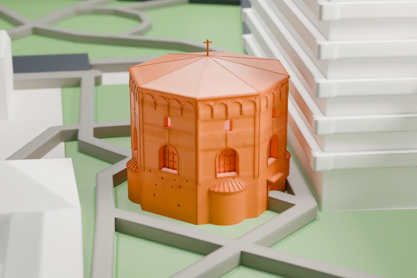 A white 3D print of the Baptistery of Neon, an octagonal brick building with a low tiled roof and a small cross, among the surrounding streets and buildings of Ravenna.