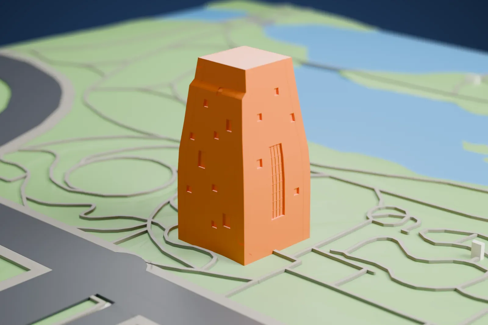 A white 3D print of the Barack Obama Presidential Center, a tall tower rising from lower buildings, in a green park with city blocks beyond.