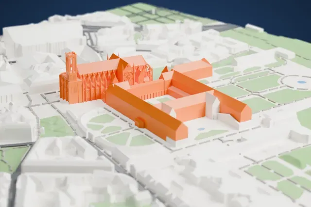 A white 3D print of the Basilica of Saint-Denis, a long church with a single tower, flying buttresses and a rounded east end, surrounded by buildings, small green lawns and streets.