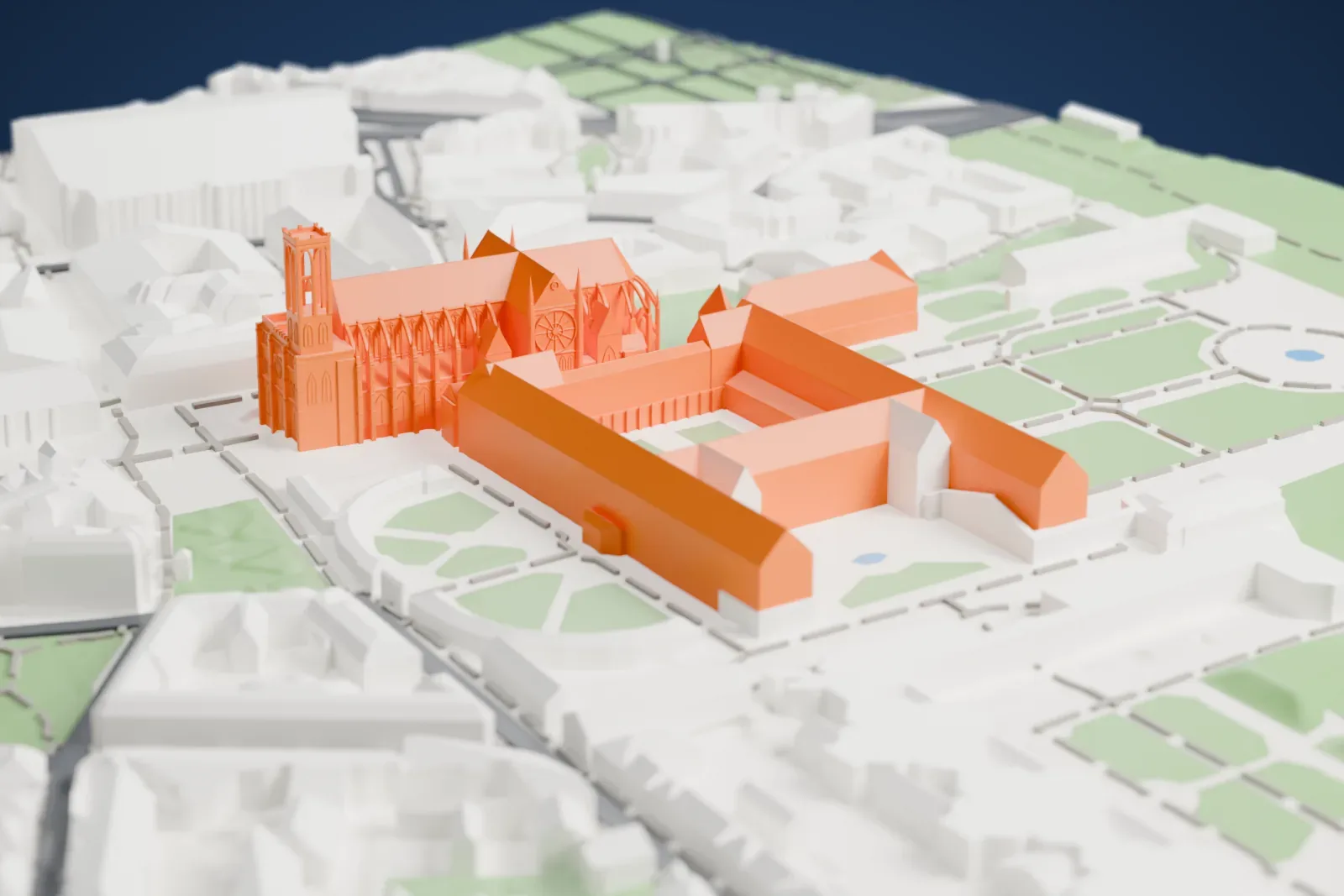 A white 3D print of the Basilica of Saint-Denis, a long church with a single tower, flying buttresses and a rounded east end, surrounded by buildings, small green lawns and streets.