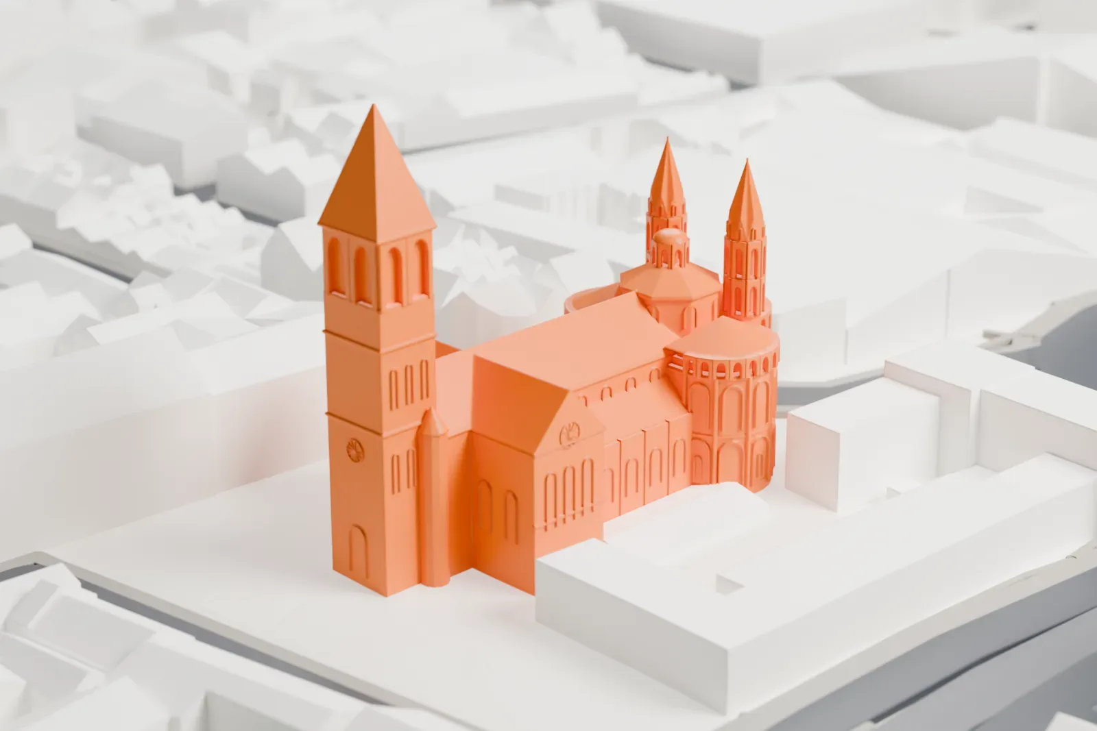 A white 3D print of the Basilica of the Holy Apostles with its single west tower, surrounded by city streets and buildings.