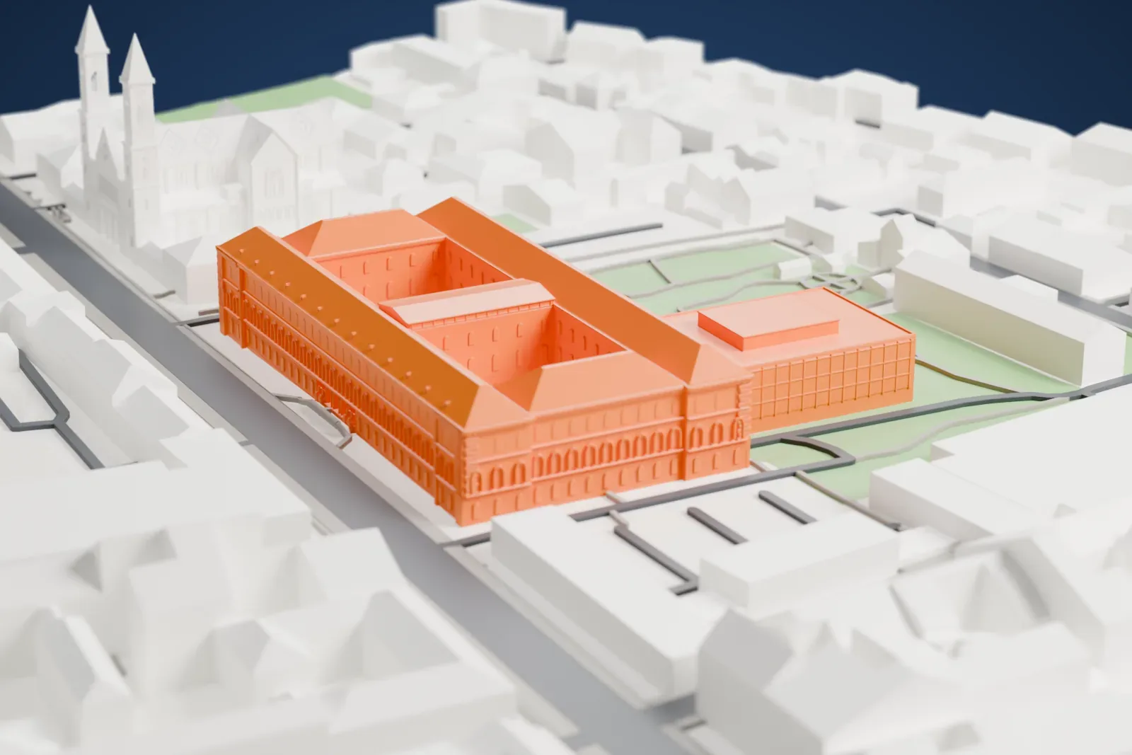 A white 3D print of the Bavarian State Library on the Ludwigstrasse, with the surrounding city buildings.