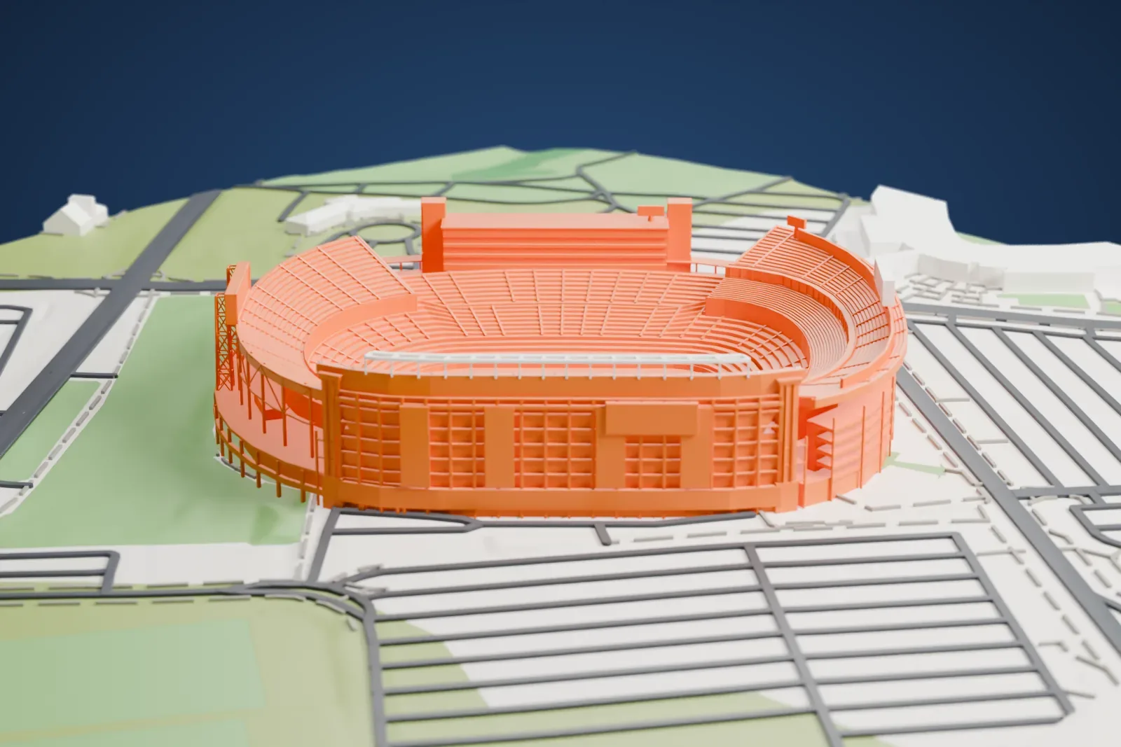 A white 3D print of Beaver Stadium, a large oval bowl of stacked seating tiers with tall scoreboards at the ends, set among campus roads, grass fields and parking areas.