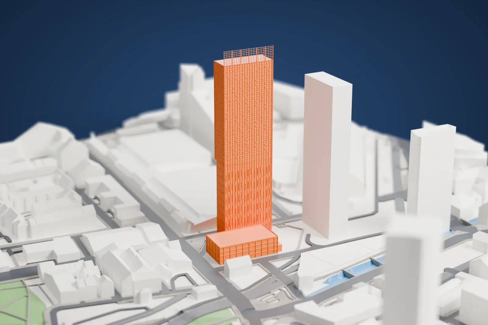 A white 3D print of Beetham Tower, a slender tower rising above the surrounding streets and buildings of Manchester.