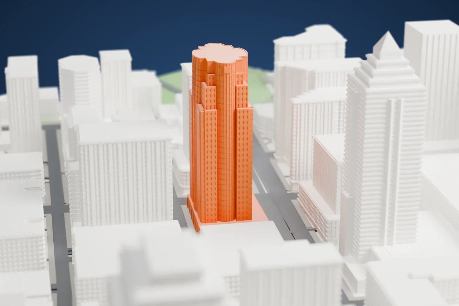 A white 3D print of the Bell Media Tower standing among the surrounding streets and buildings.