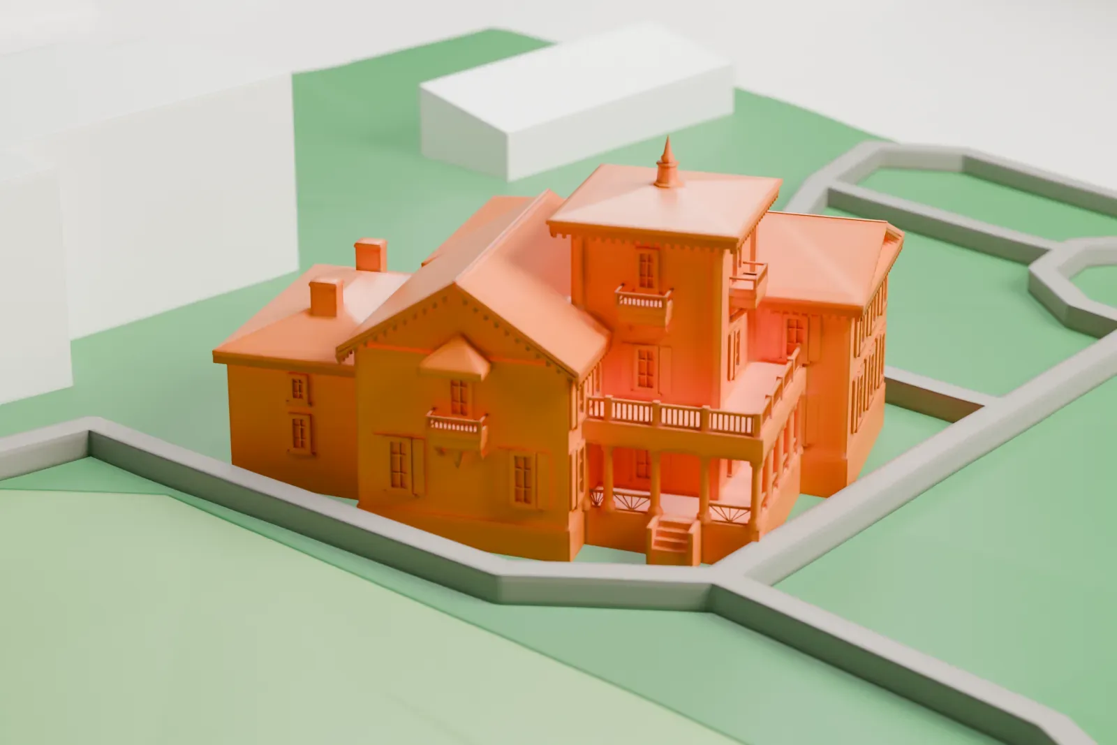 A white 3D print of Bellevue House, a historic villa, among the surrounding streets and buildings.
