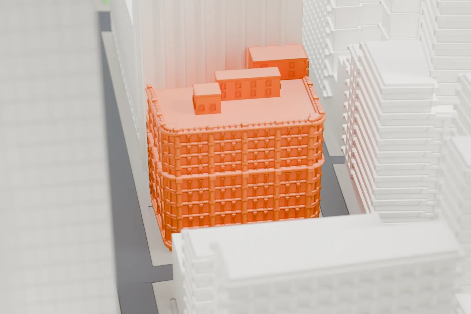 A white 3D print of the Bennett Building, a tall block with rows of arched windows and a stepped roof, partly hidden between much taller towers.