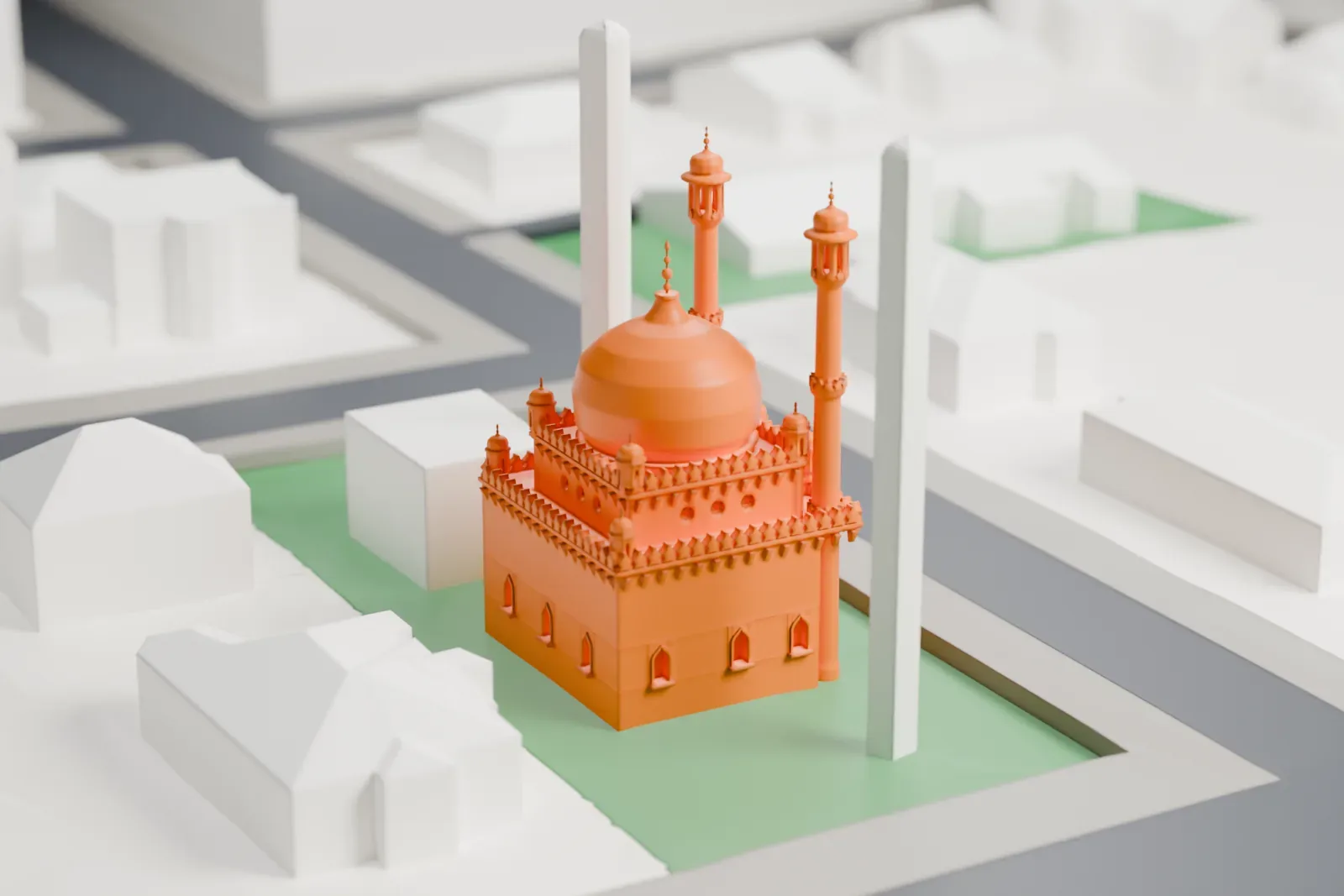 A white 3D print of the Berlin Mosque, with its onion dome and two minarets, among the surrounding city streets.