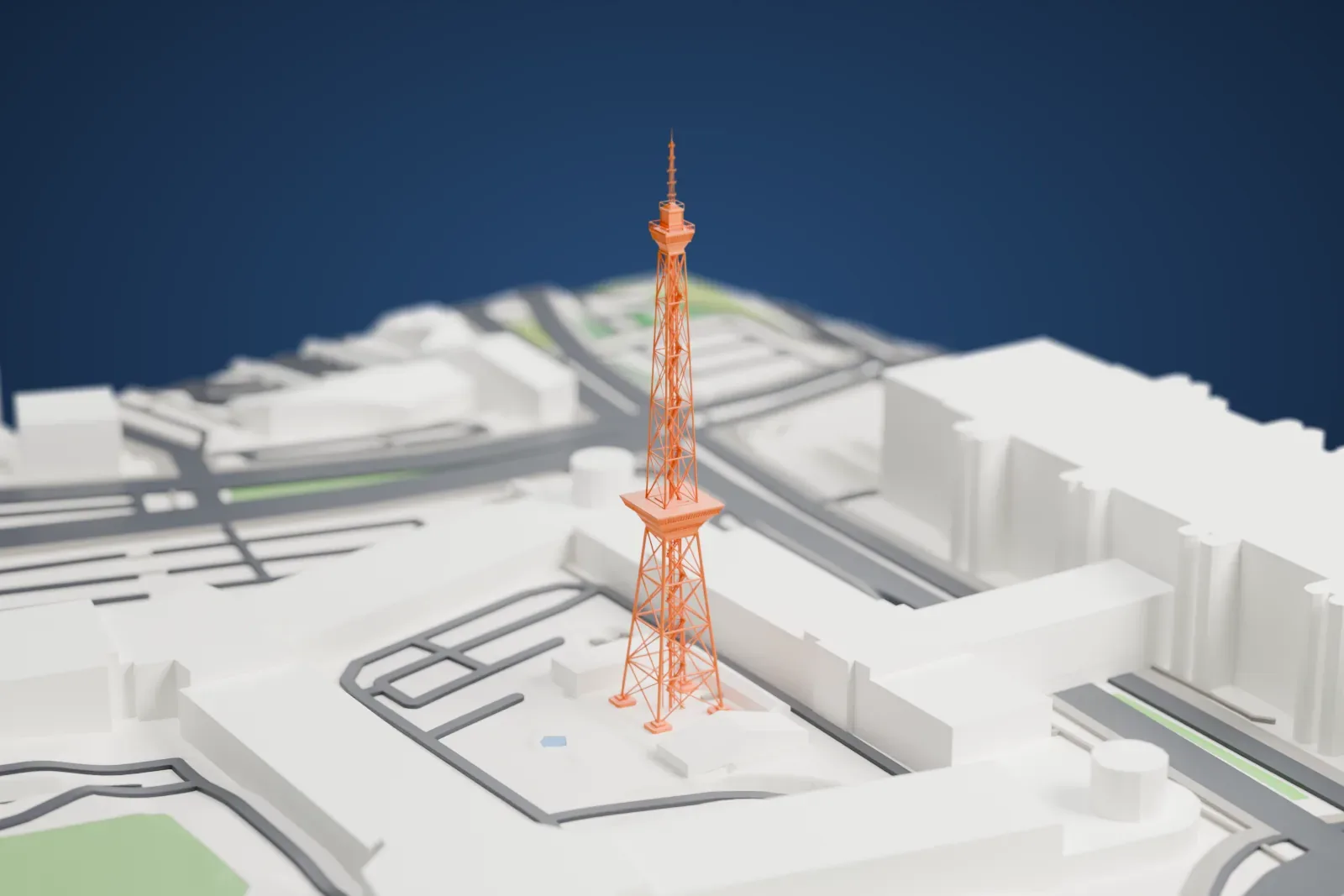 A white 3D print of the Berlin Radio Tower on the Messe Berlin fairgrounds, with the surrounding buildings.