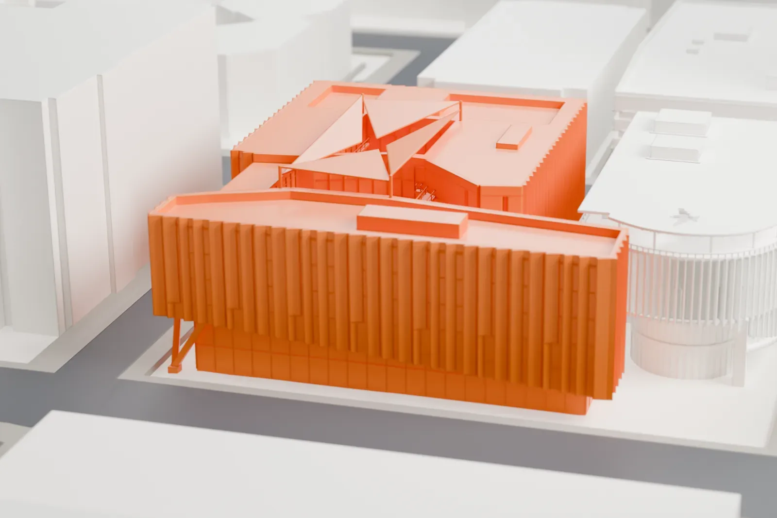 A white 3D print of the Beus Center for Law and Society, a low building with two stone-clad wings around an open passage, among the surrounding streets and buildings of Phoenix.
