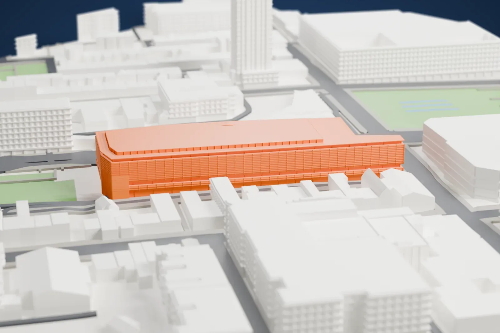 A white 3D print of the Grande Bibliothèque among the surrounding streets and buildings.
