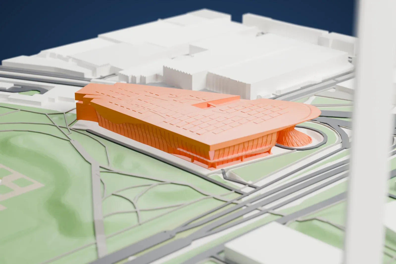 A white 3D print of BMW Welt, a wide building mass on its footprint, with surrounding buildings and streets near the Olympic Park in Munich.