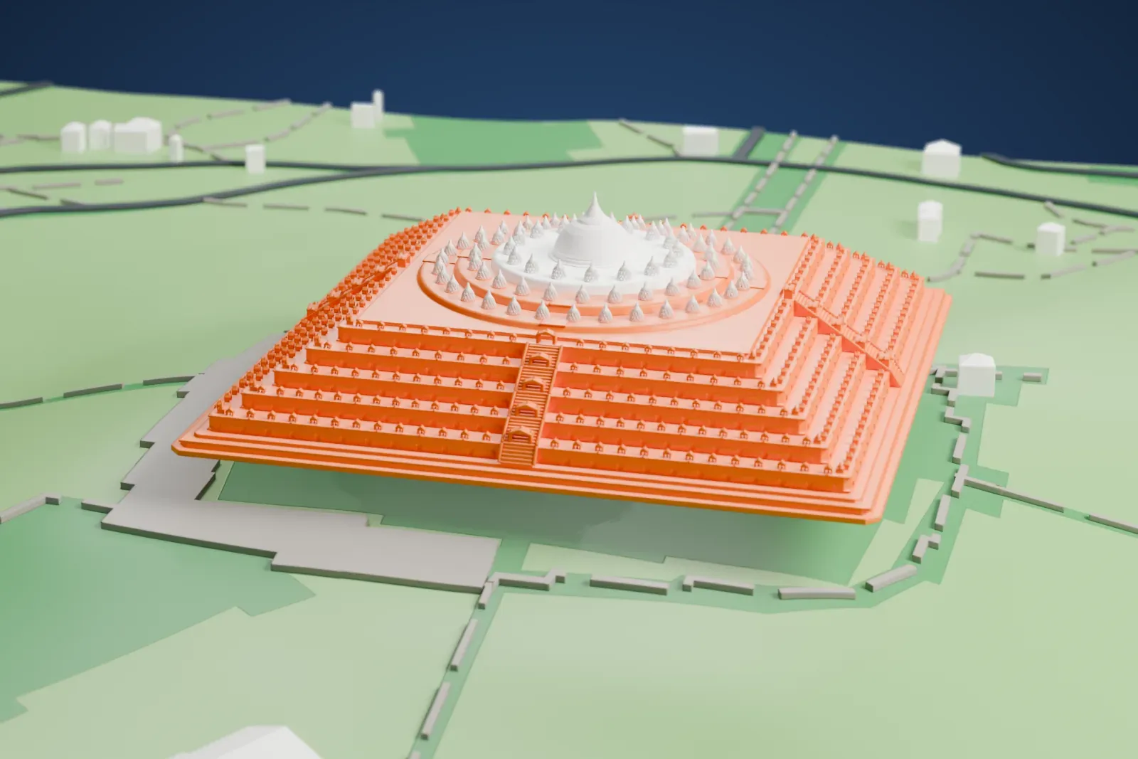 A white 3D print of Borobudur, a wide stepped temple of square terraces topped by circular tiers of small stupas around a central dome, standing on open green ground beside a paved apron.