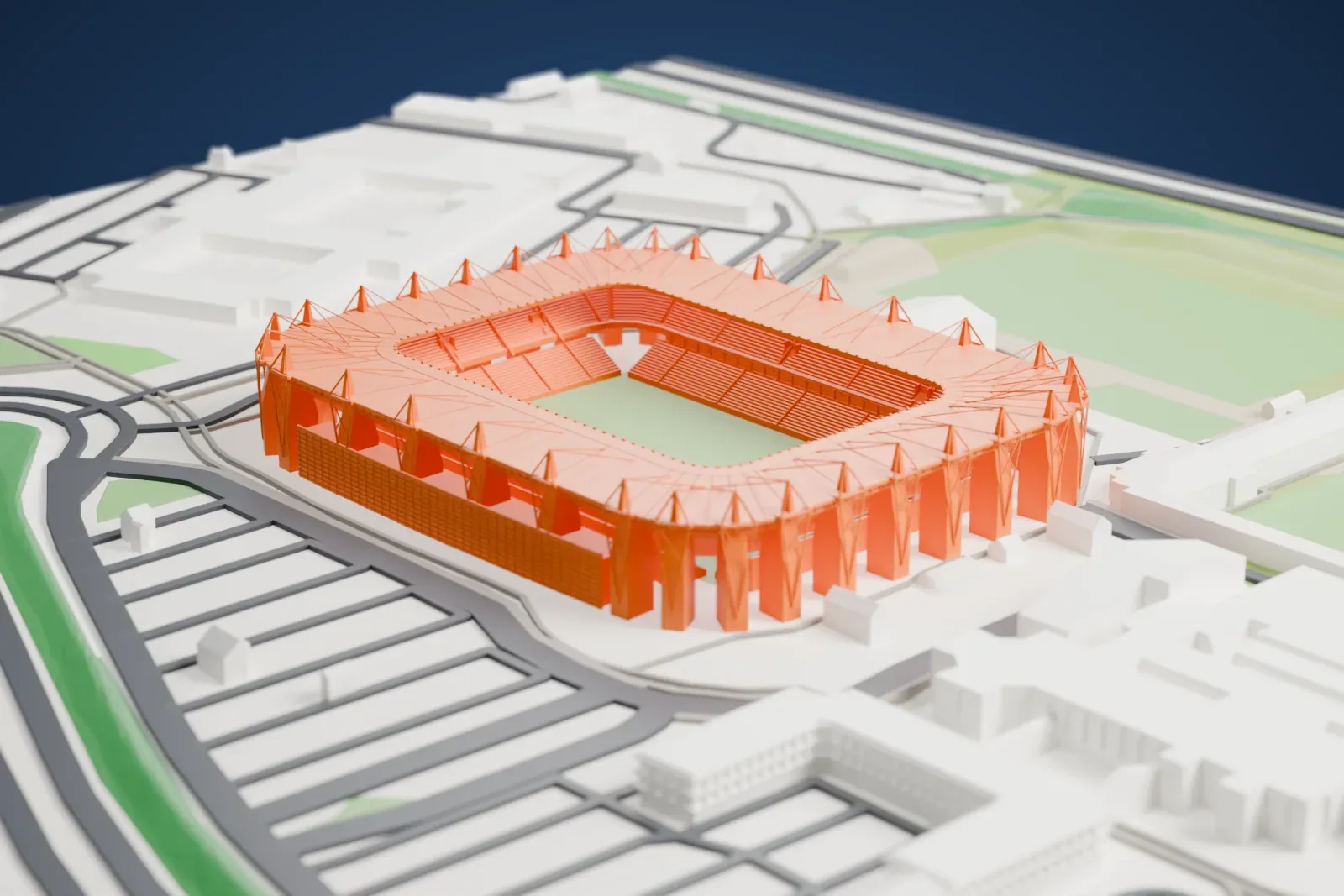 A white 3D print of Brøndby Stadium, showing its rounded rectangular roof ring, open pitch and the streets and buildings around it.
