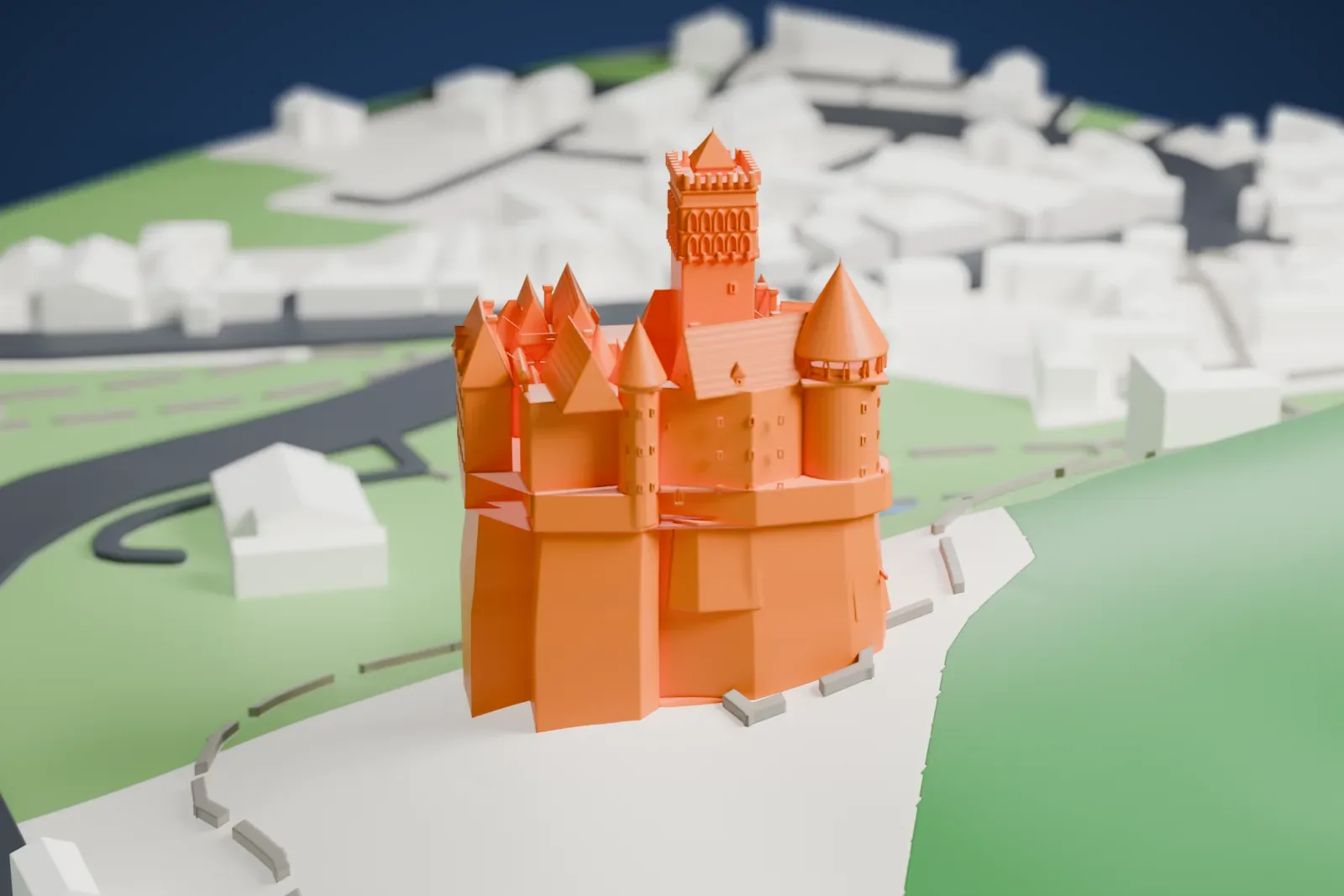 A white 3D print of Bran Castle, a hillside castle with a tall square tower, conical turrets and steep gabled roofs on a rocky base, beside a road, a stream and forested slopes.