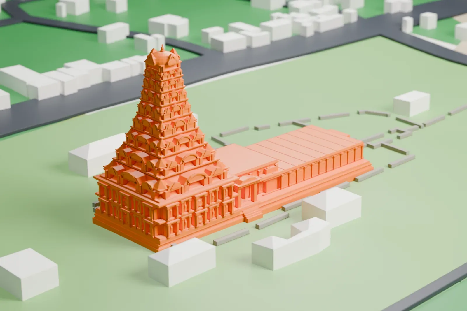 A white 3D print of the Brihadisvara Temple, a stepped tower with a long low hall beside it, surrounded by low walls, small buildings and open ground.