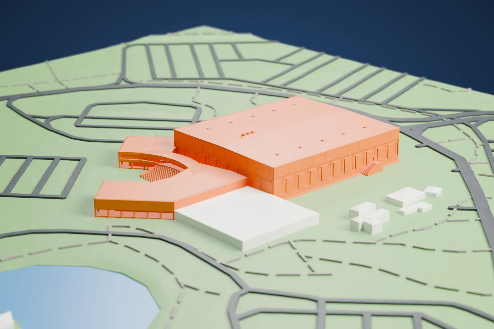 A white 3D print of the Brisbane Entertainment Centre with its broad roof and low entrance wing surrounded by roads, green spaces, nearby buildings, and a pond.