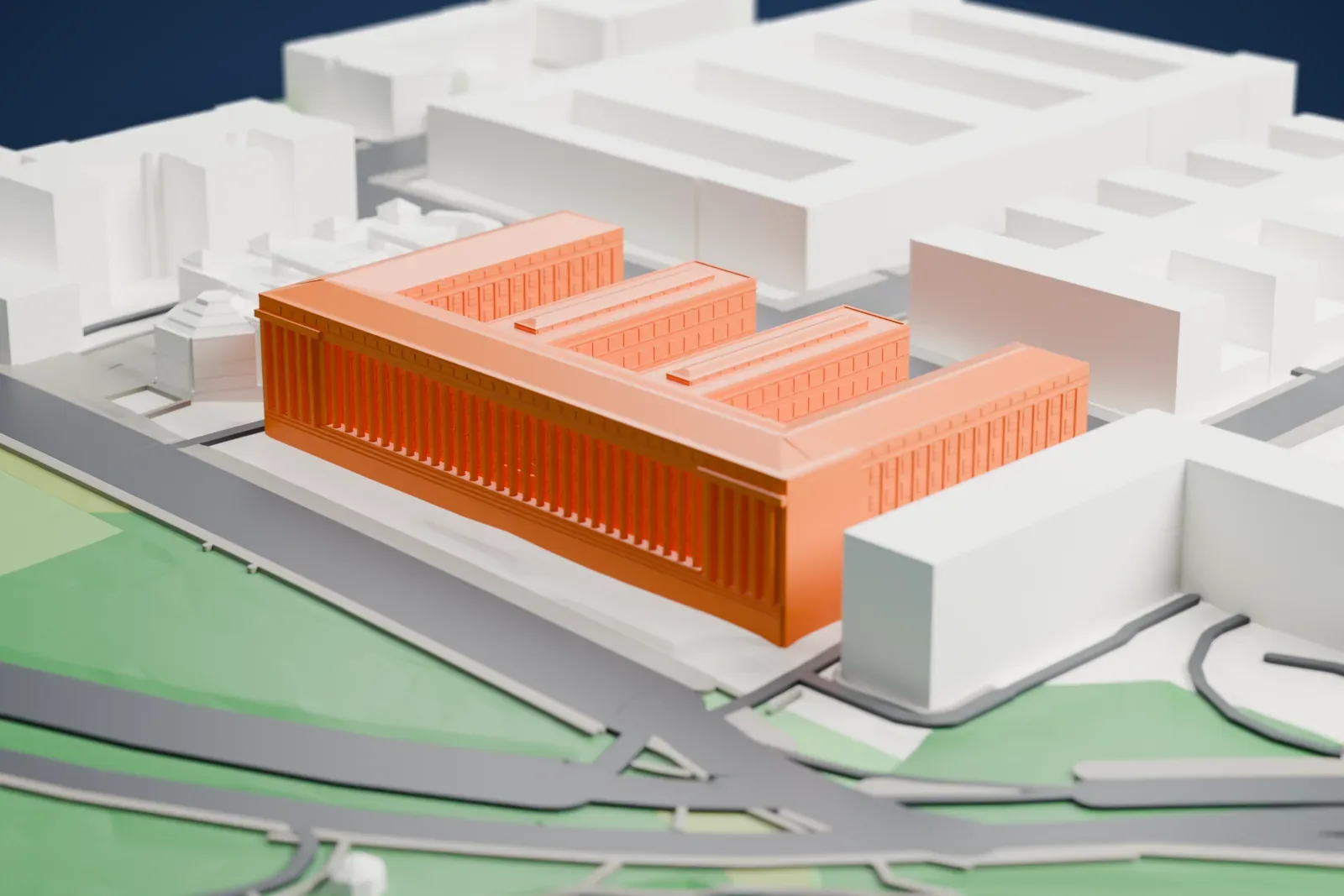 A white 3D print of the Bureau of Engraving and Printing, a long, low building filling its block among surrounding streets and buildings.