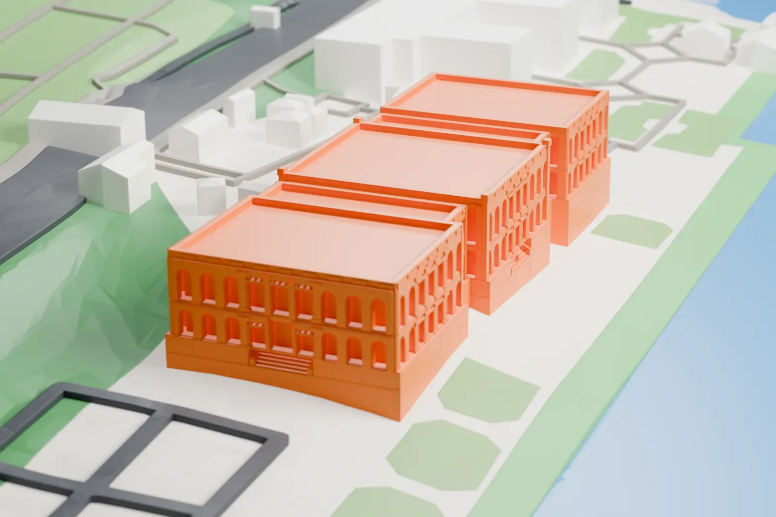 A white 3D print of the Çırağan Palace, a long low building, with the Bosporus along one side and city buildings behind it.