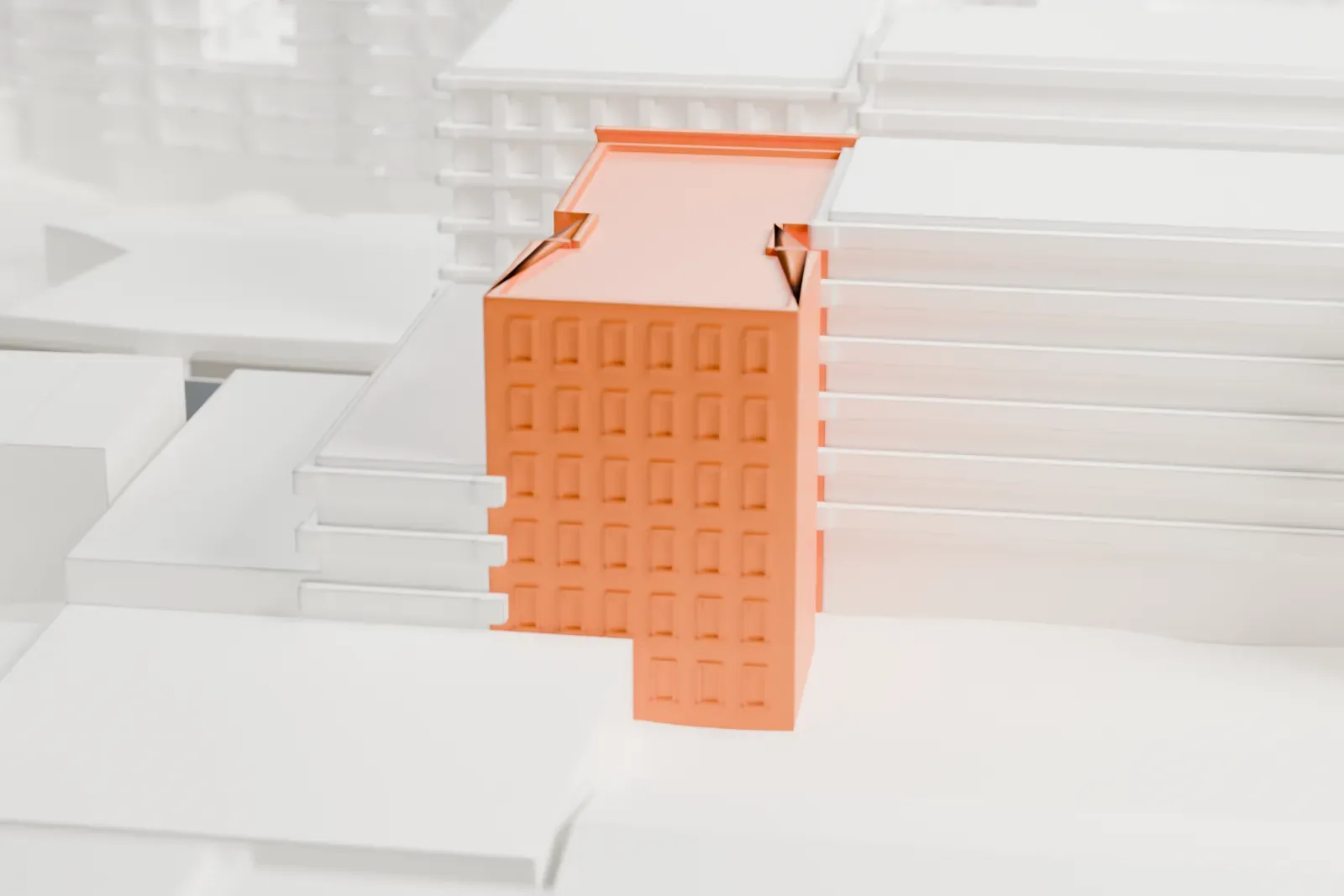 A white 3D print of C. Rieger’s Sons Factory, a tall brick factory with a detailed front facade, standing among larger buildings and streets.