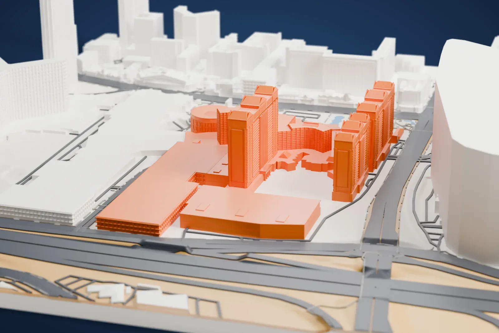 A white 3D print of Caesars Palace, with its hotel towers and a round drum-shaped building, among neighboring hotel buildings and wide roads.