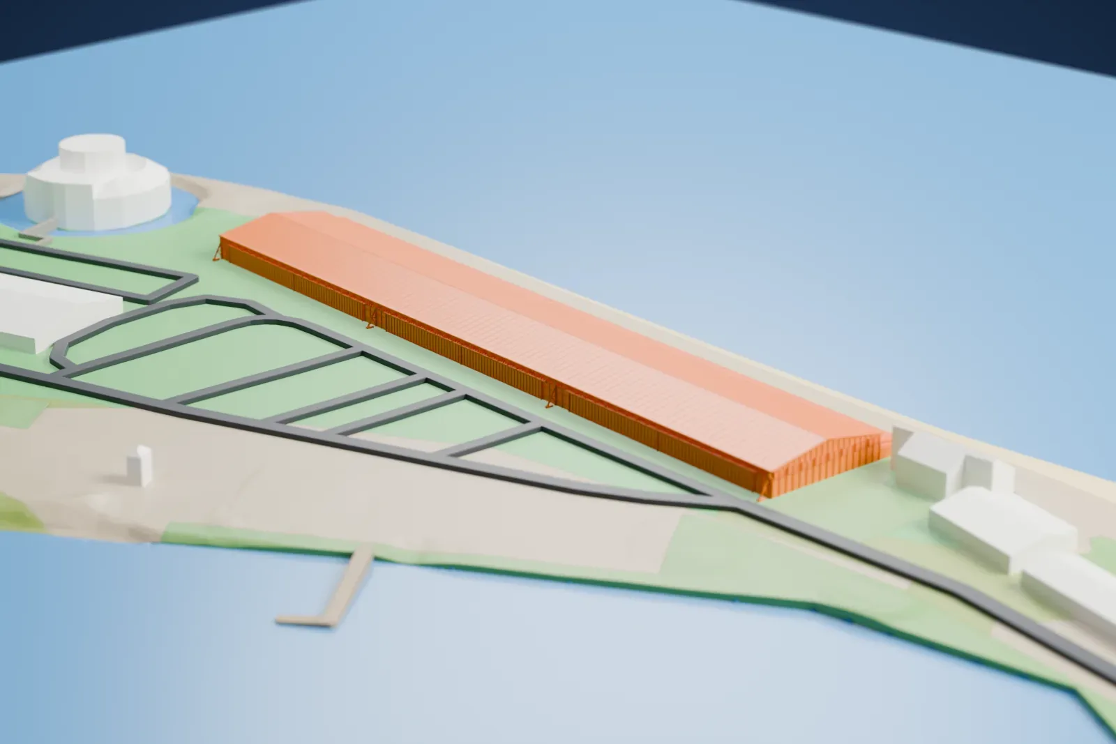 A white 3D print of the Calshot main flying boat hangar, a long low hangar with a shallow pitched roof, a lower side lean-to and rows of high windows, among surrounding buildings.