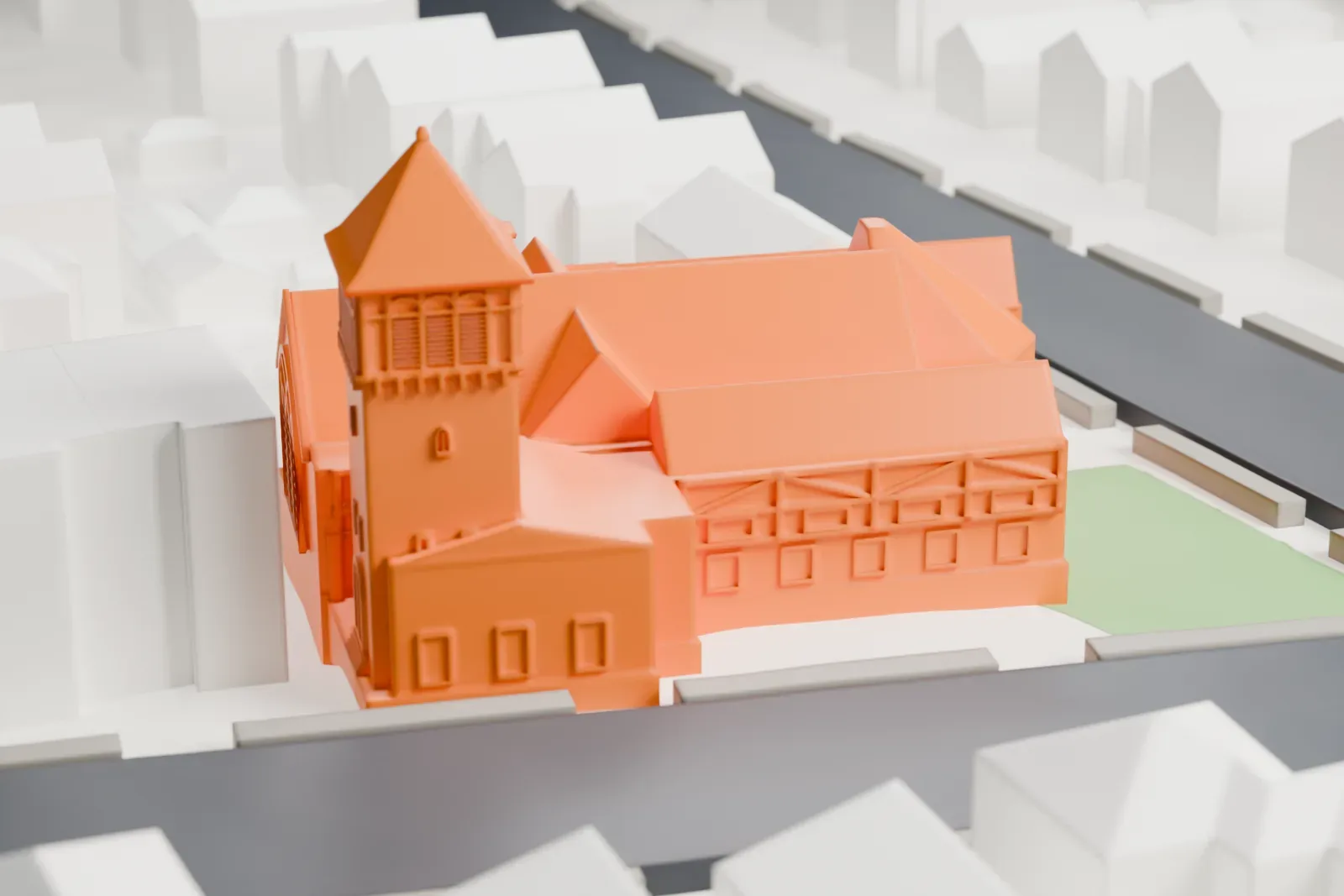 A white 3D print of a church with a square bell tower and several gabled roofs, surrounded by houses and streets.