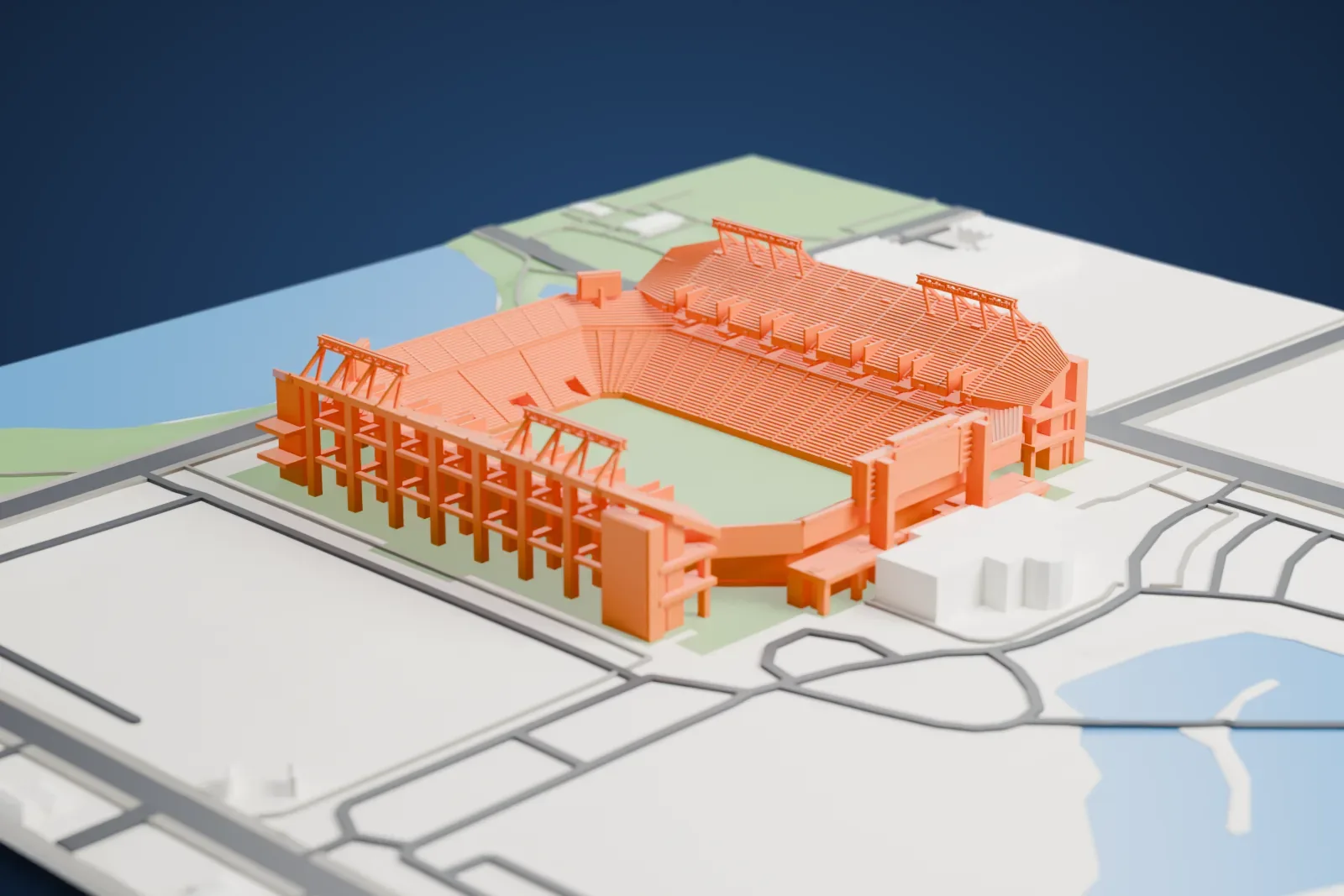 A white 3D print of Camping World Stadium, a wide stadium bowl among surrounding streets and buildings in Orlando.