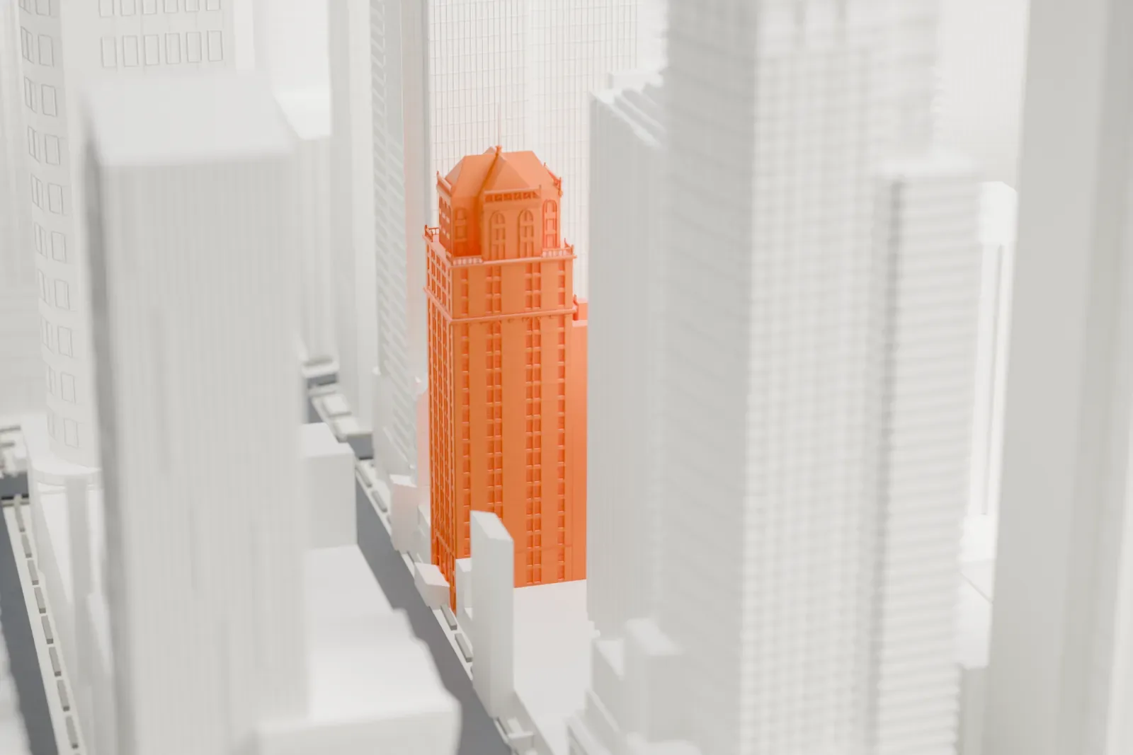 A white 3D print of the Candler Building, a slim tower with a hip roof beside a lower wing, hemmed in by much taller buildings.