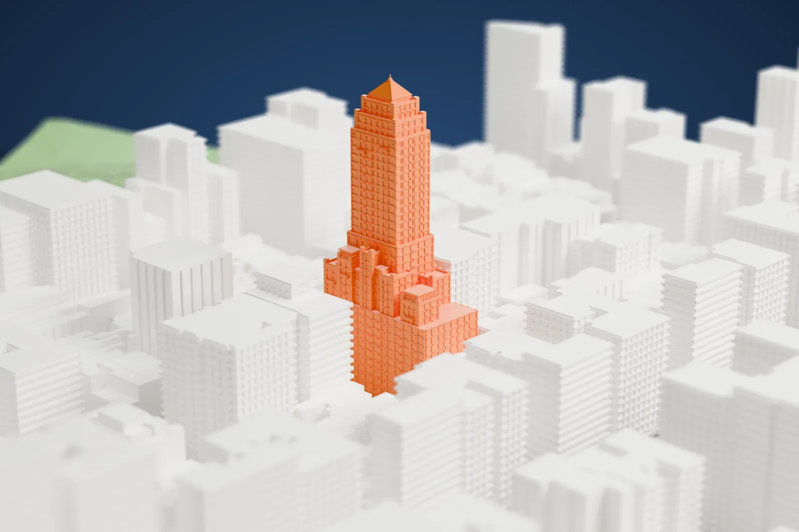 A white 3D print of the Carlyle Hotel, a tall stepped tower with a pyramid roof, rising among lower buildings on city streets.