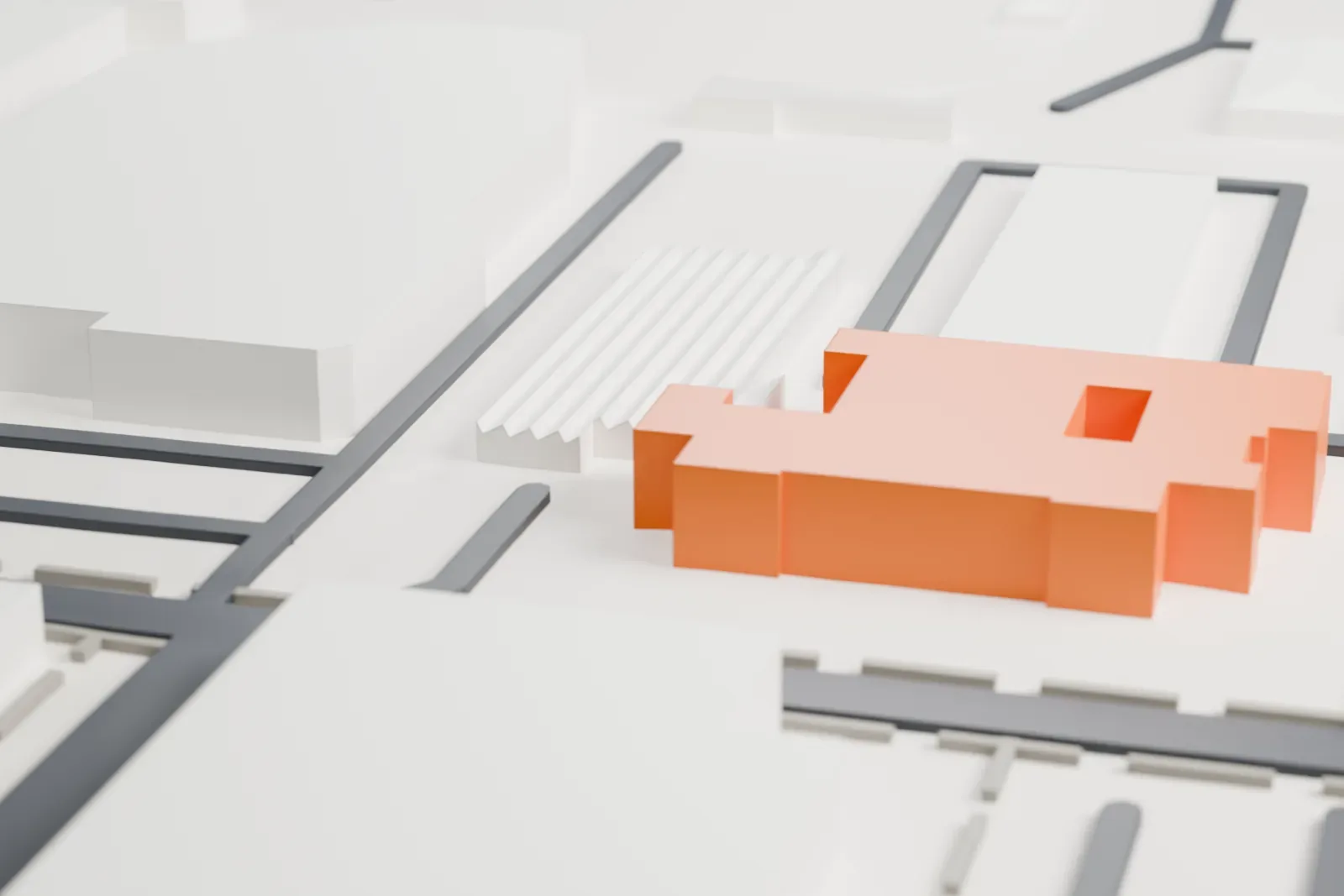 A white 3D print of the Carver High School building, a long, low school with rows of windows, set among streets and neighboring buildings.