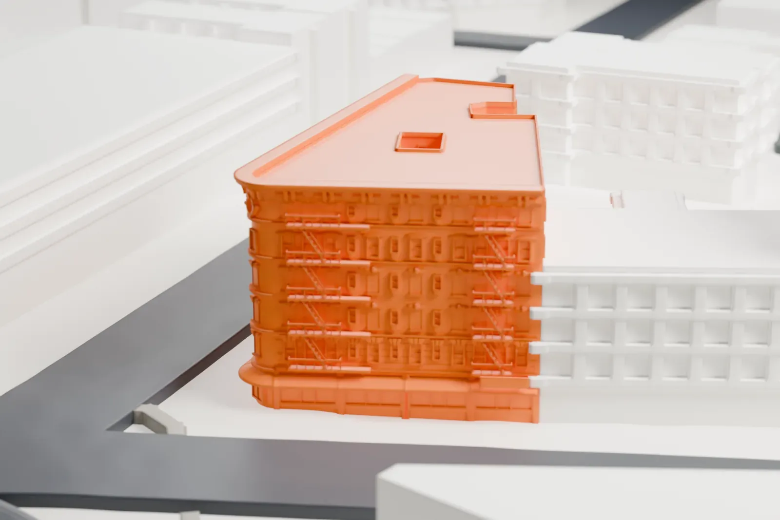 A white 3D print of Casa Amadeo, a six-story corner building with fire escapes on its walls, standing among streets and lower buildings.