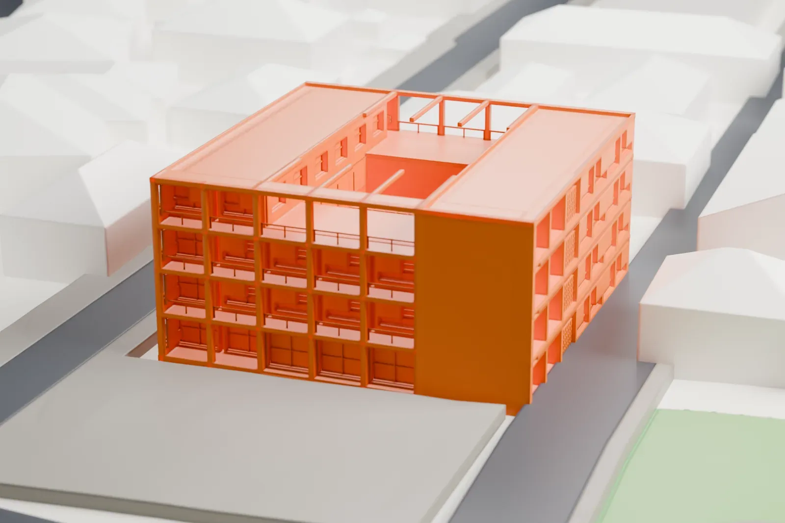A white 3D print of the Casa del Fascio, a square four-story building with a flat roof, among the surrounding buildings of Como.