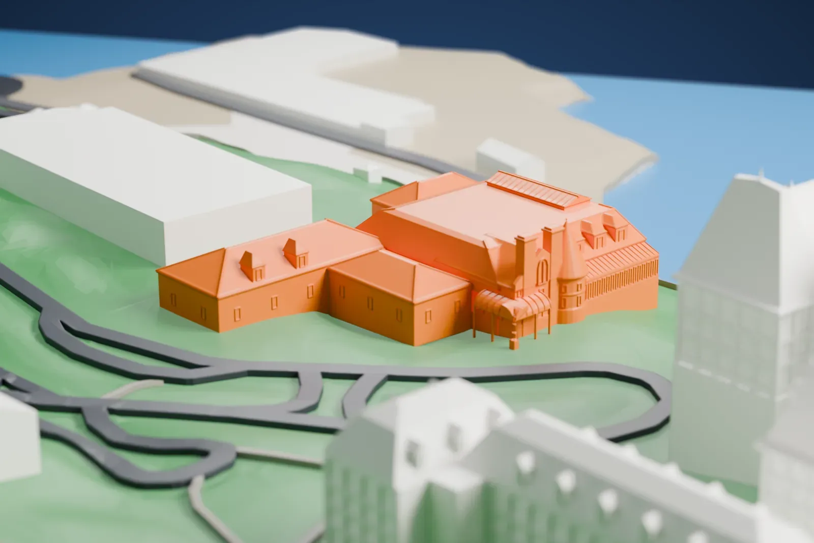A white 3D print of the Casino de Charlevoix with its surroundings.