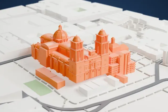 A white 3D print of the Catedral Metropolitana de México model in Mexico City, with the streets around it.