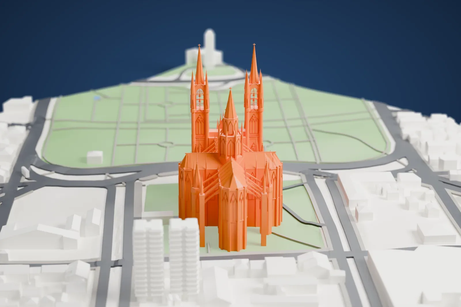 A white 3D print of the Cathedral of La Plata among the surrounding streets and buildings.