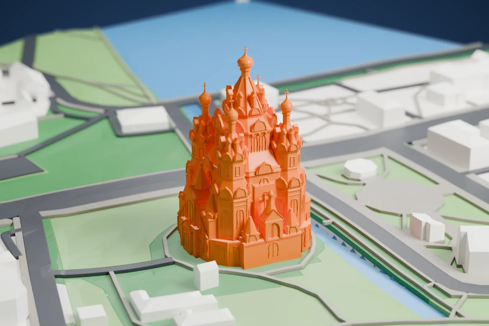 A white 3D print of the Cathedral of Saints Peter and Paul among the surrounding streets and buildings.