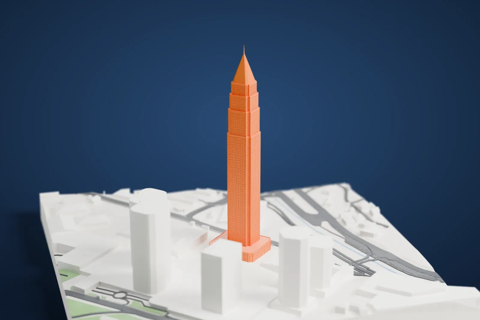 A white 3D print of CBRT Tower, a tall skyscraper rising above surrounding city buildings.