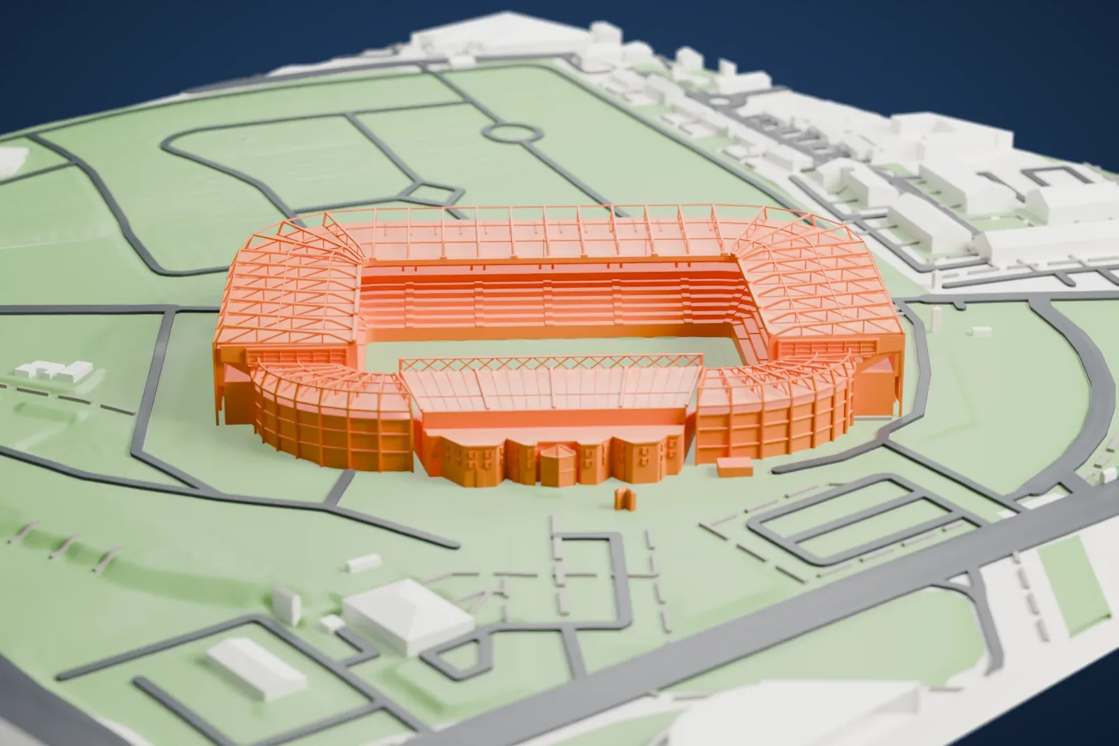 A white 3D print of Celtic Park, an oval football stadium with braced walls and a truss roof, standing on open green ground with roads and a few houses nearby.