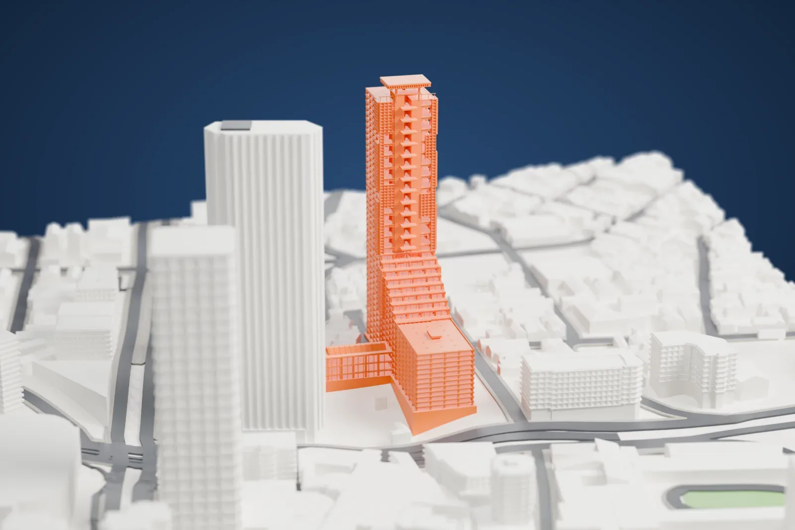 A white 3D print of the unfinished Centro Financiero Confinanzas, its exposed frame rising above the surrounding streets and buildings in downtown Caracas.