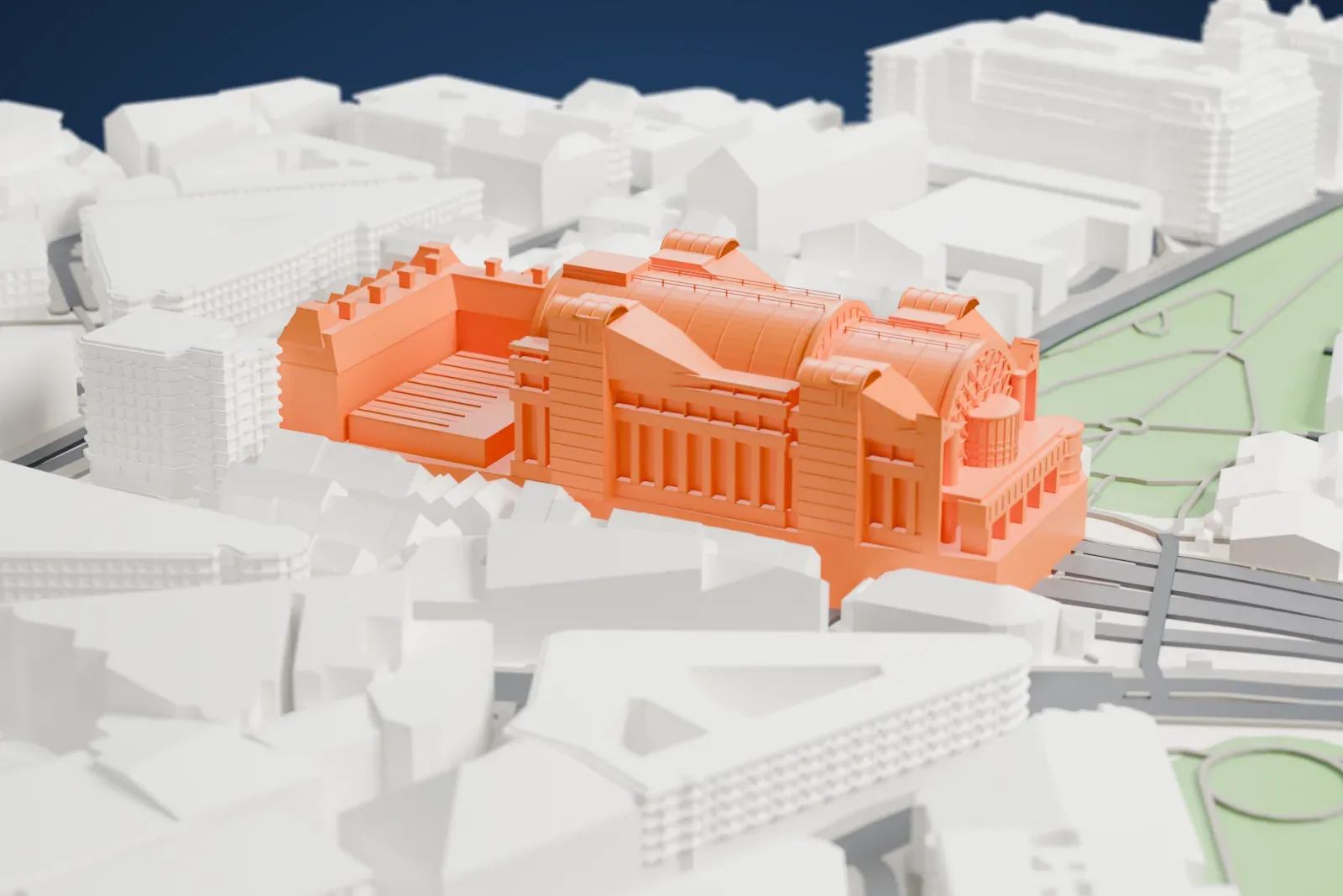 A white 3D print of Charing Cross railway station in London, with the surrounding streets and buildings around it.