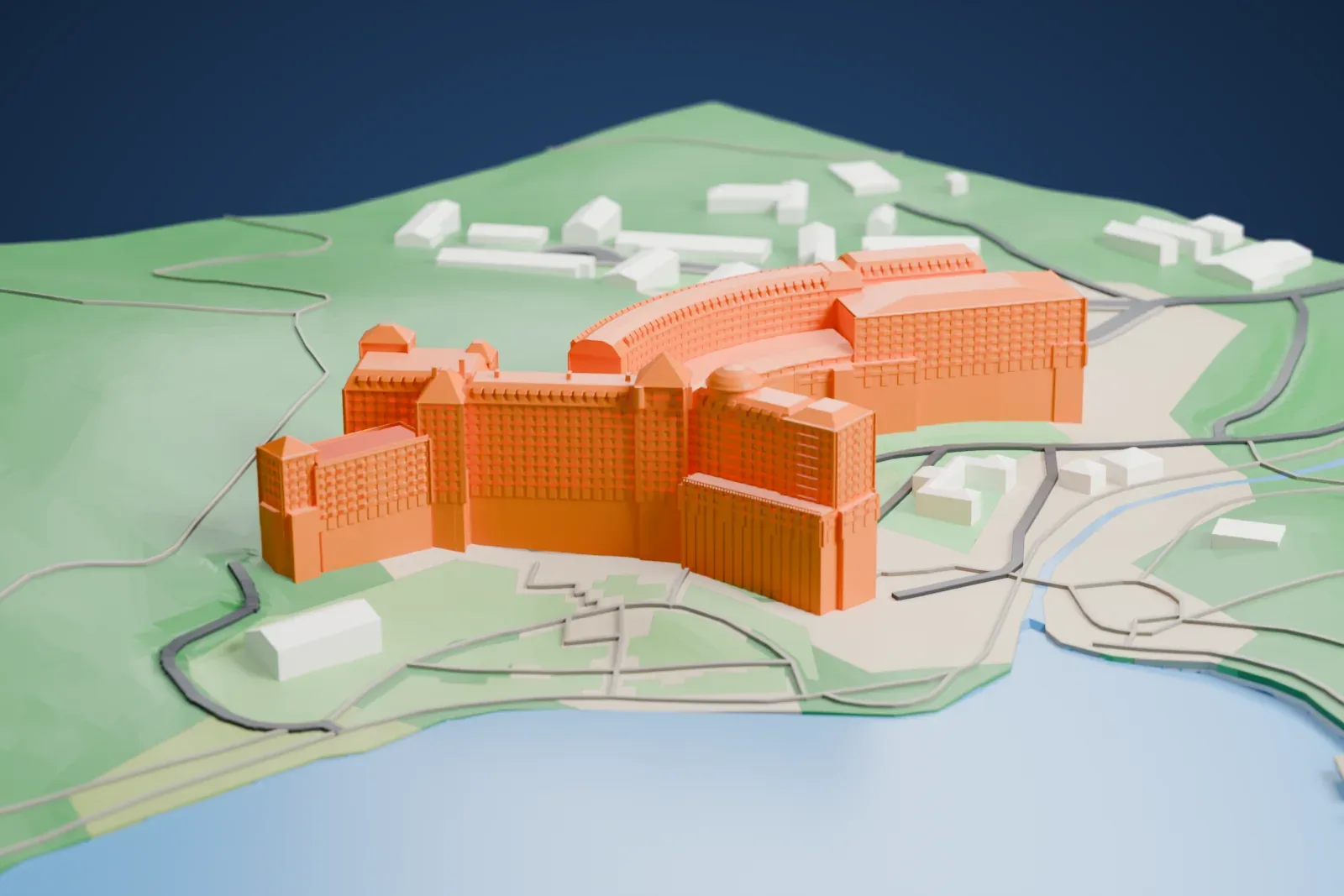 A white 3D print of Chateau Lake Louise among the surrounding streets and buildings.