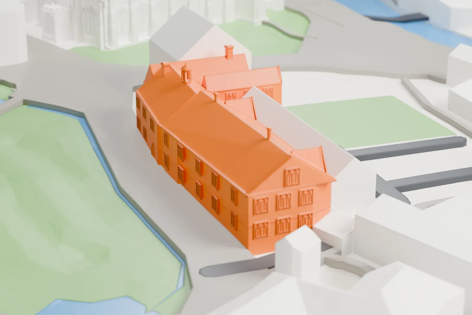 A white 3D print of Chetham's Library in Manchester, with the surrounding streets and buildings.