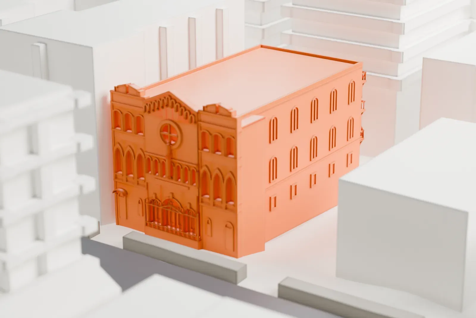A white 3D print of a three-story synagogue with an ornate front facade, standing between larger buildings on a city street.