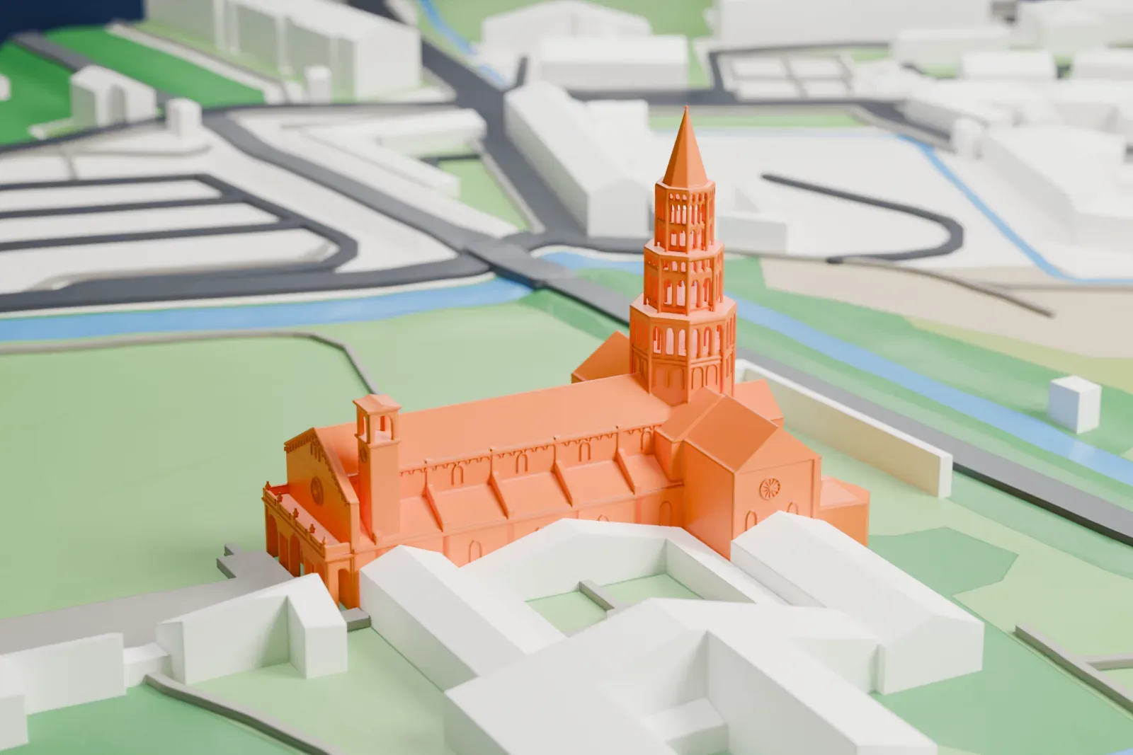 A white 3D print of Chiaravalle Abbey among surrounding streets and buildings.