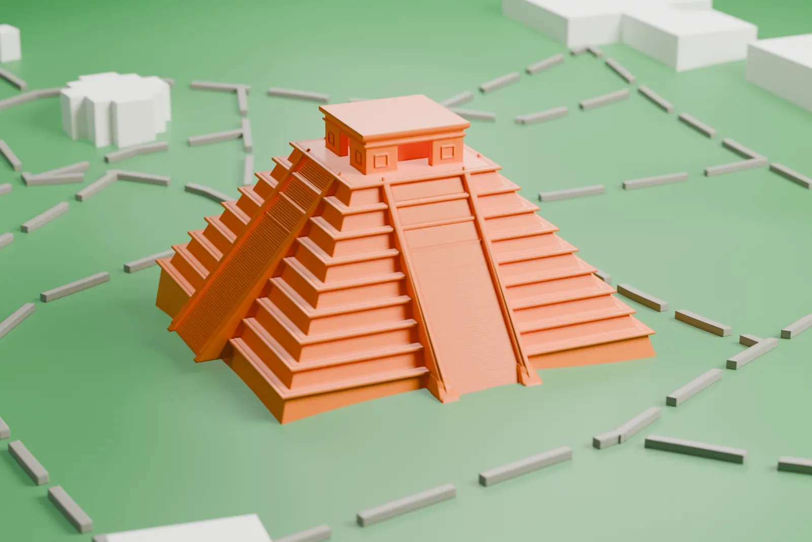 A white 3D print of the stepped pyramid at Chichen Itza, with wide terraces, staircases up its sides and a small temple on top, standing alone on open ground crossed by faint paths.