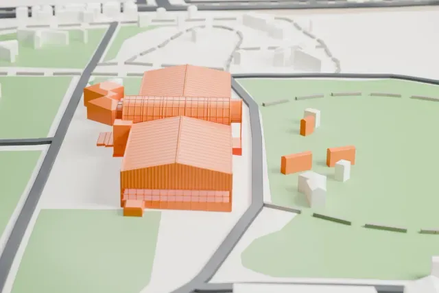 A white 3D print of the Chilean National Aeronautical and Space Museum Hangar model in Santiago, with the streets around it.