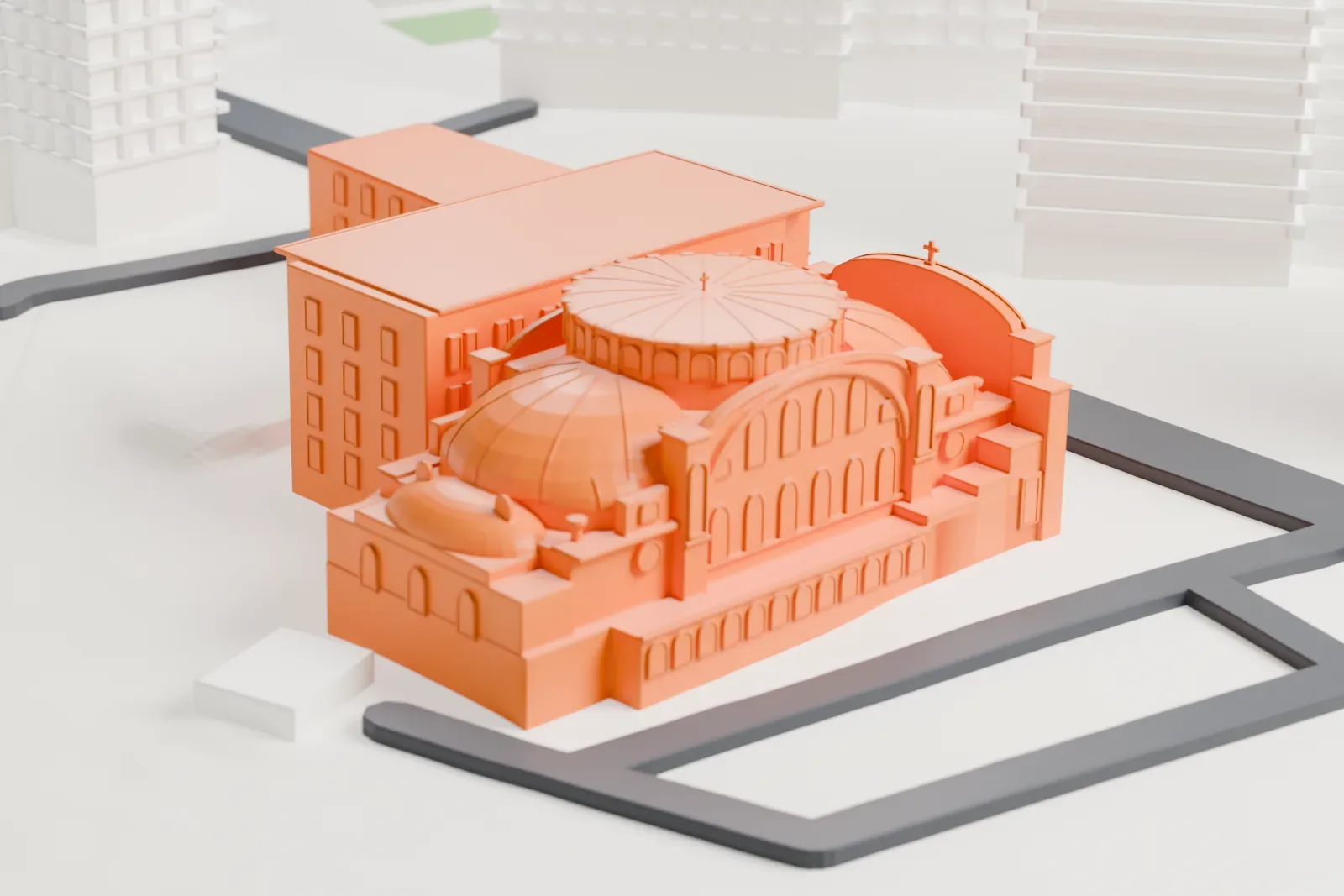 A white 3D print of the Church of St. Anselm and St. Roch, a brick church topped by a large ribbed dome with smaller domes around it, between taller buildings and streets.
